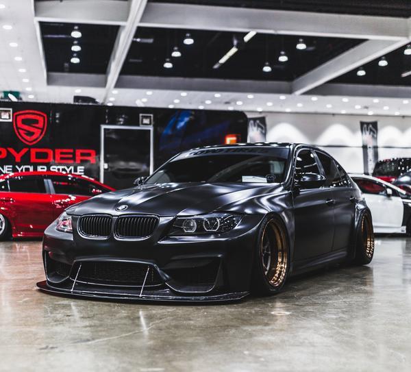 front angled view of BMW E90 with a Custom Wide Body Kit